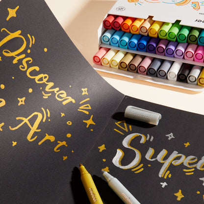 Acrylic Markers with Round Nib in 36 Colors creating vibrant designs on black paper with text &