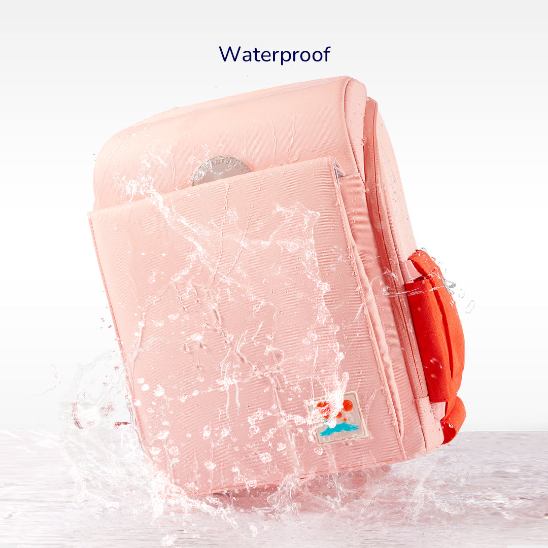 Sakura pink 3D waist-relief ergonomic backpack for children showing waterproof feature with water splashes