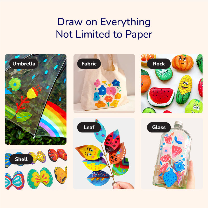 Versatile acrylic markers with ultra soft nib used on various surfaces including umbrella, fabric, rock, leaf, shell, and glass showing vibrant colors and creative designs.