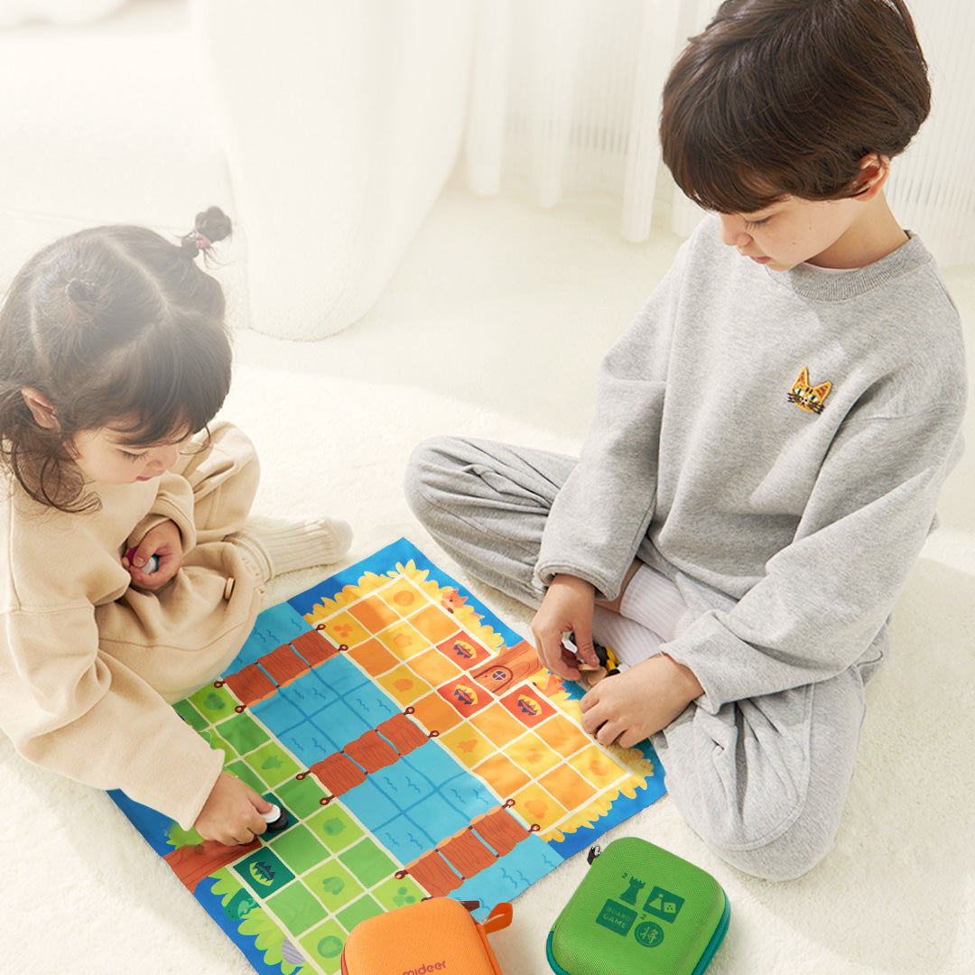 Children playing with portable 2 in 1 Snake Chess and Goose Chess game on a double-sided fabric board.